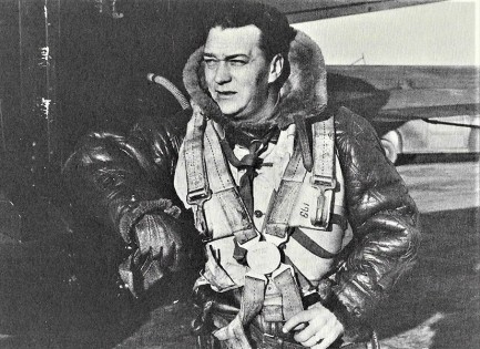 CBC Engineer Harold (Waddy) Wadsworth just prior to taking off in a bomber to record impressions over enemy territory.<br>Photo - CBC