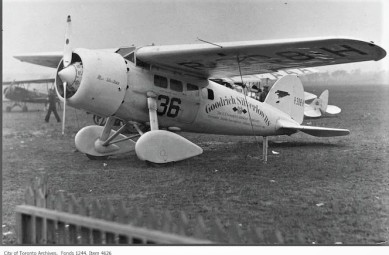 A visiting Lockheed Vega at Toronto Flying Club on Wilson Avenue 1930s