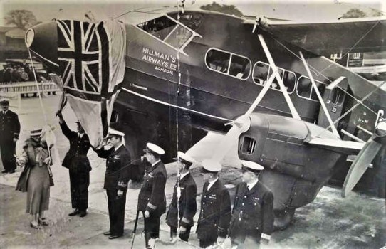 Annointing a new deHavilland DH86 Express, powered by four Gipsy Engines, with Champagne!