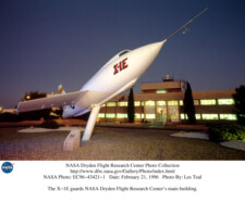 The X-1E guards NASA Dryden Flight Research Center's main building. The X-1E guards NASA Dryden Flight Research Center's main building.