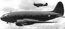 Curtiss C-46 & P-40F Warhawk In Flight Curtiss C-46 & P-40F Warhawk In Flight