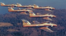 The RCAF Golden Centennaires Aerobatic Team - 1967 The RCAF Golden Centennaires Aerobatic Team - 1967. Air to air view of the Golden Centennaires (Tutor Aircraft) flying in formation