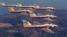 The RCAF Golden Centennaires Aerobatic Team - 1967 The RCAF Golden Centennaires Aerobatic Team - 1967. Air to air view of the Golden Centennaires (Tutor Aircraft) flying in formation